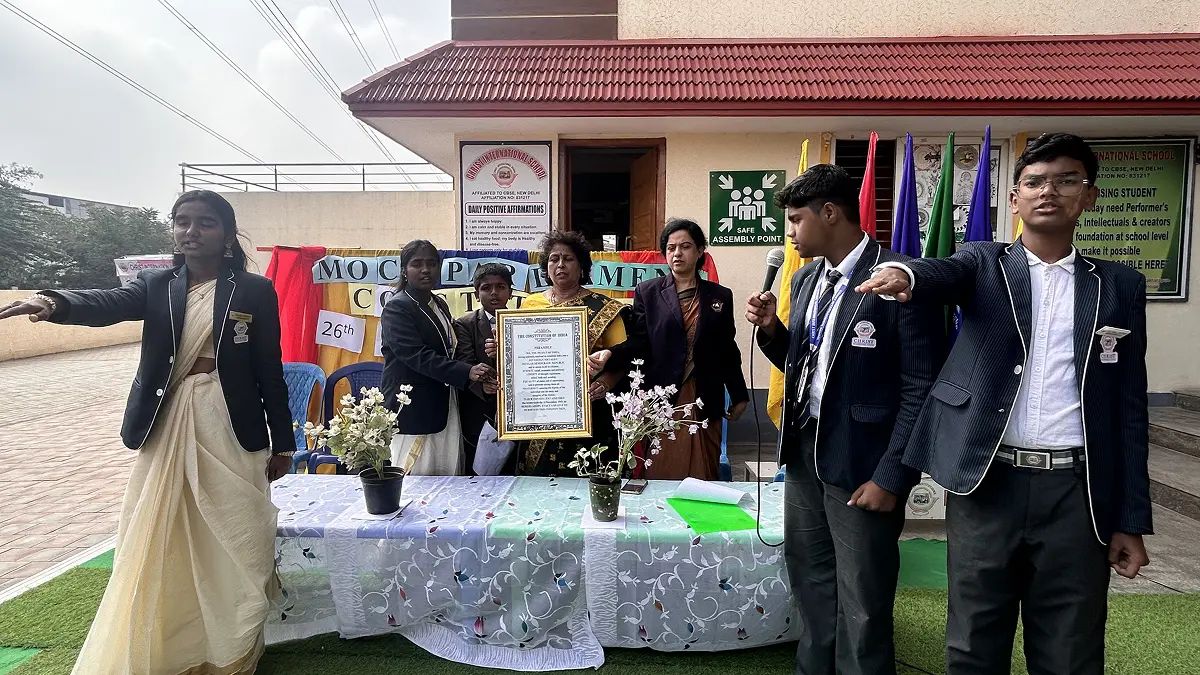 students - teacher taking oath